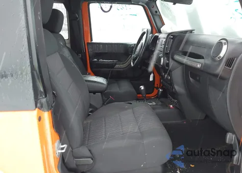 2012 Jeep Wrangler Sport z USA, uszkodzony, nr VIN 1C4AJWAG7CL186283